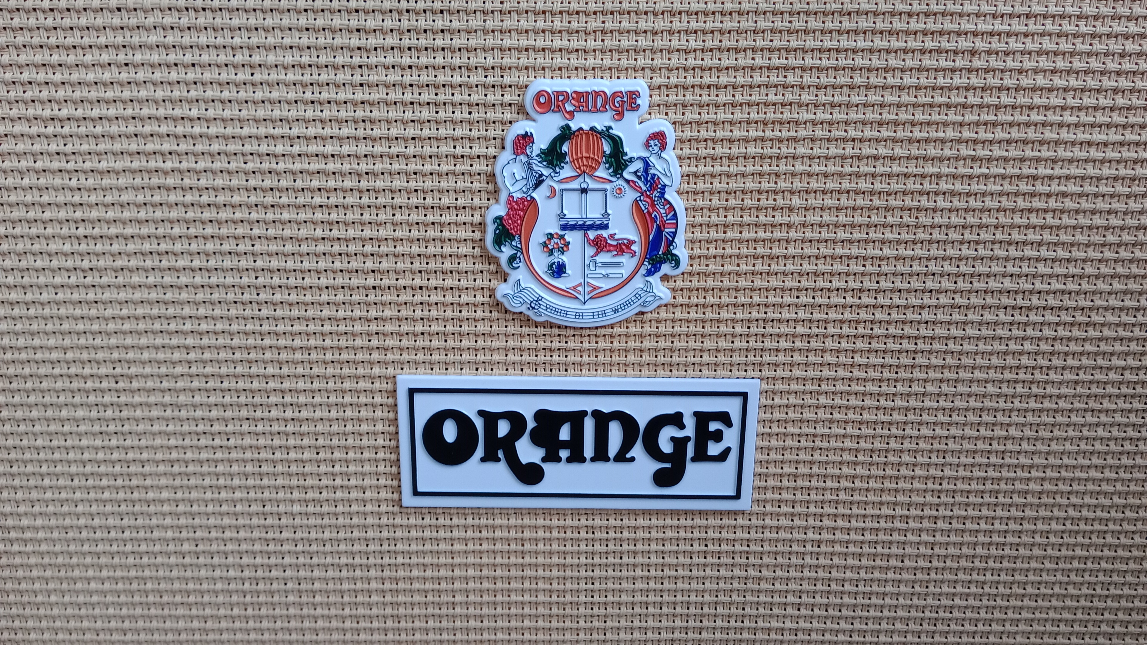 The badge on a guitar amp that says 